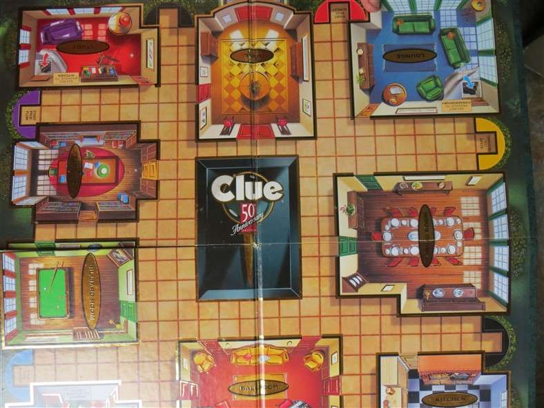 50th Anniversary Edition of Clue in Tin with Metal Murder Weapons & Players