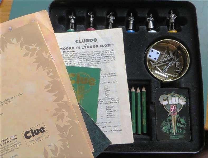 50th Anniversary Edition of Clue in Tin with Metal Murder Weapons & Players