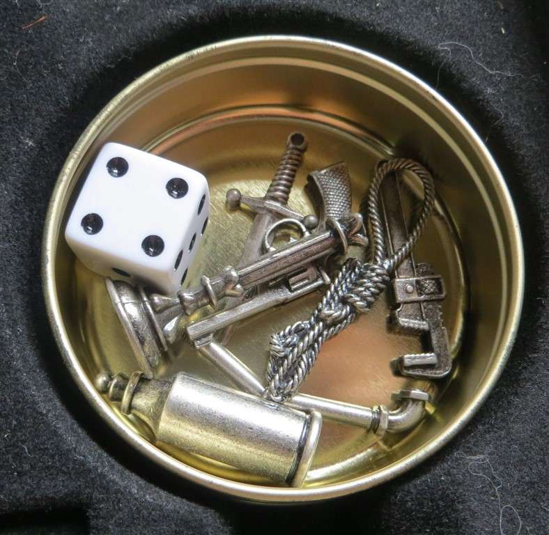 50th Anniversary Edition of Clue in Tin with Metal Murder Weapons & Players