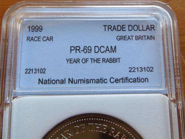 1999 GB Trade Dollar - Macau returns to China PF69DCAM - Year of the Rabbit