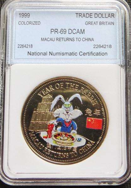 1999 GB Trade Dollar - PR89DCAM - Colourized Macau Returns to China Year of the Rabbit