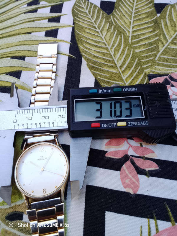 M Watch, quartz