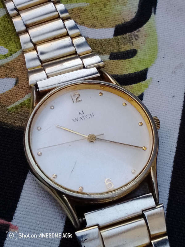 M Watch, quartz