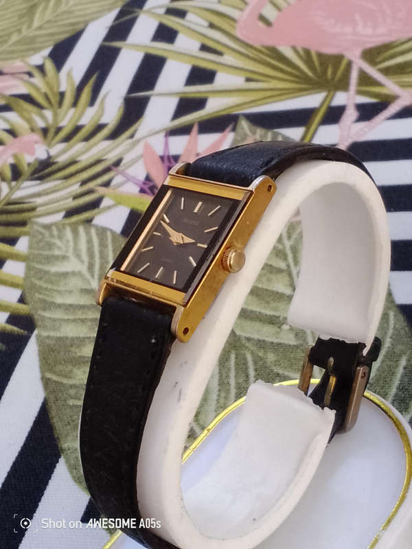 Seiko square male and Accurist female watches