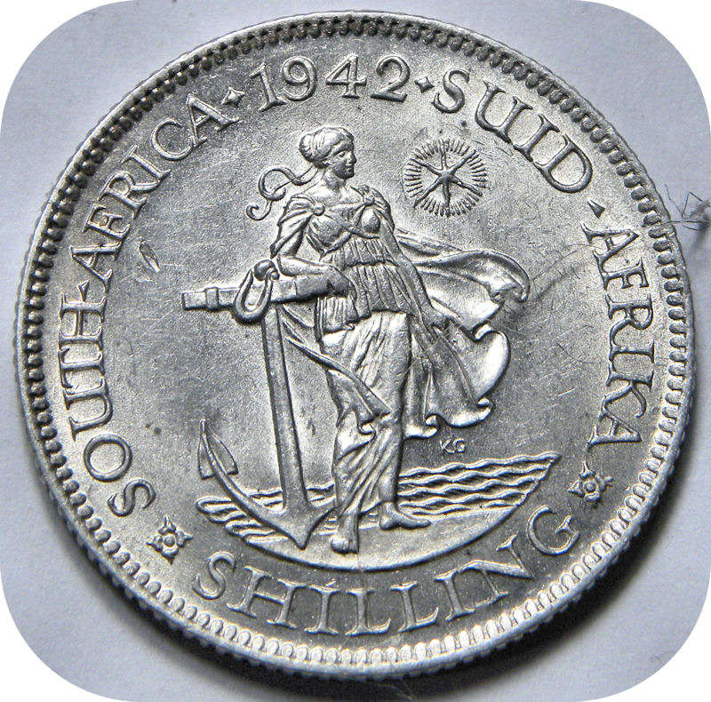 Top Grade SA Union:  1942 Shilling in UNC!!!  Will grade at NGC.