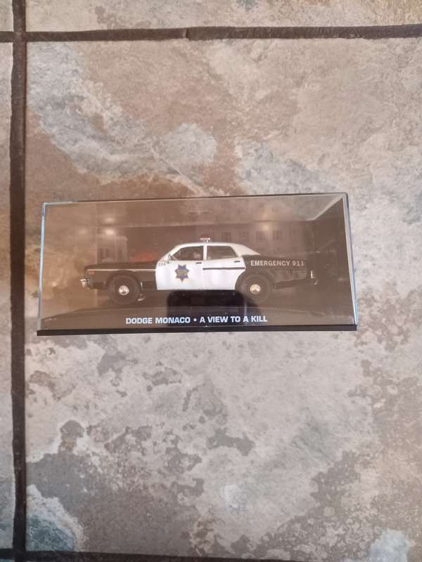 007 Dodge Monaco - View to a Kill - scale 1/43. Sealed. With Book