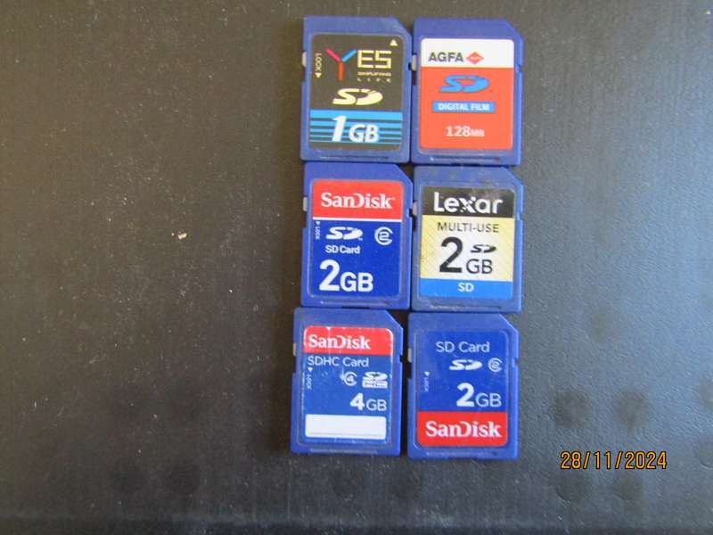 "5 SDHC Memory cards 4GB  Three 2GB 1GB and 128MB Ussed