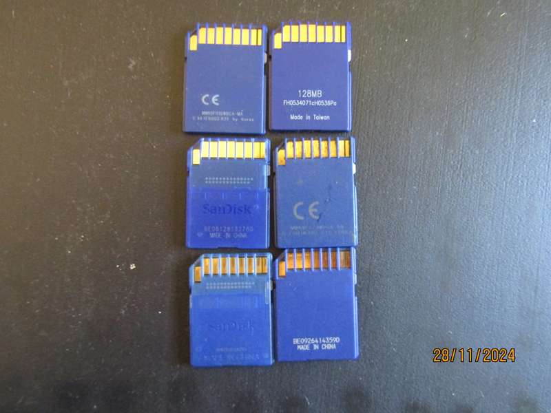 "5 SDHC Memory cards 4GB  Three 2GB 1GB and 128MB Ussed