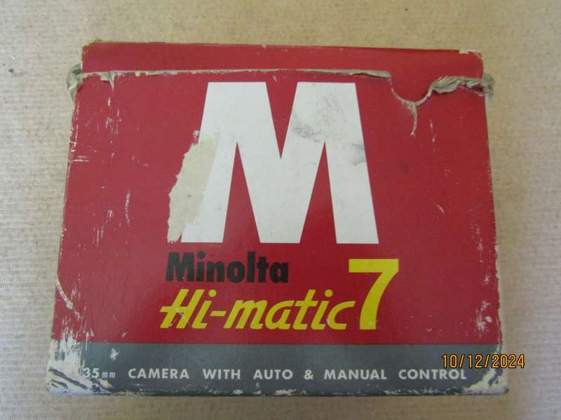 1966 Original Box with Minolta Hi- Matic 7 SLR 35 mm Camera. Tested and Works.