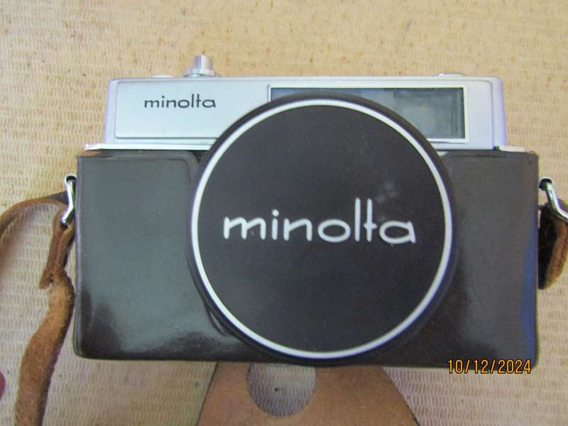 1966 Original Box with Minolta Hi- Matic 7 SLR 35 mm Camera. Tested and Works.