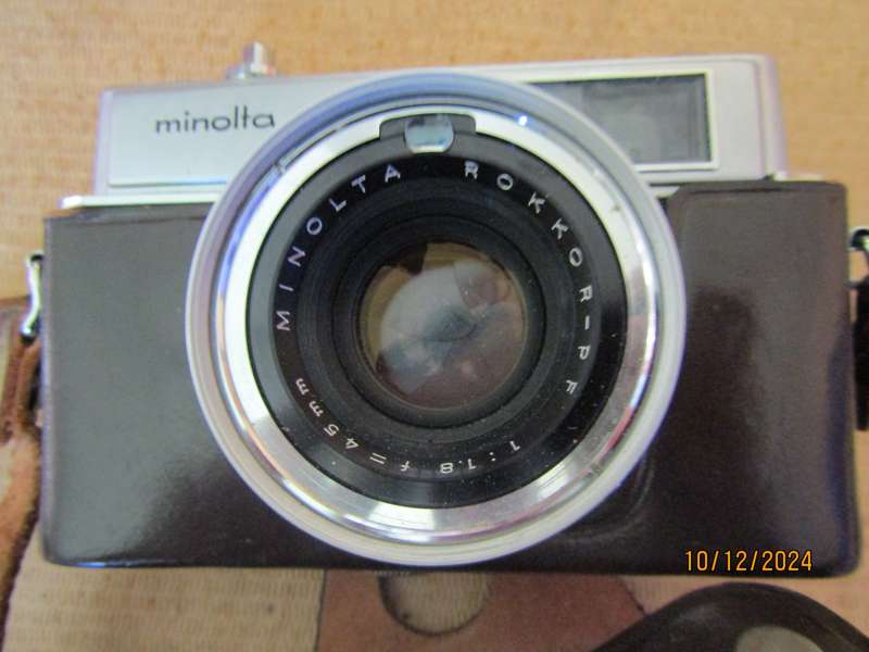 1966 Original Box with Minolta Hi- Matic 7 SLR 35 mm Camera. Tested and Works.