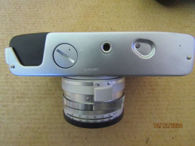 1966 Original Box with Minolta Hi- Matic 7 SLR 35 mm Camera. Tested and Works.