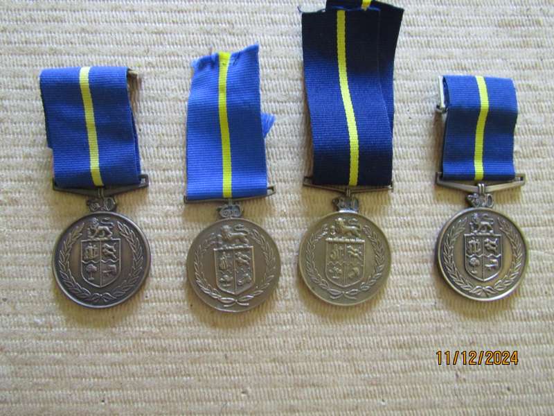 4 SAPS Faithfull Service medals Unnamed. Bid per medal