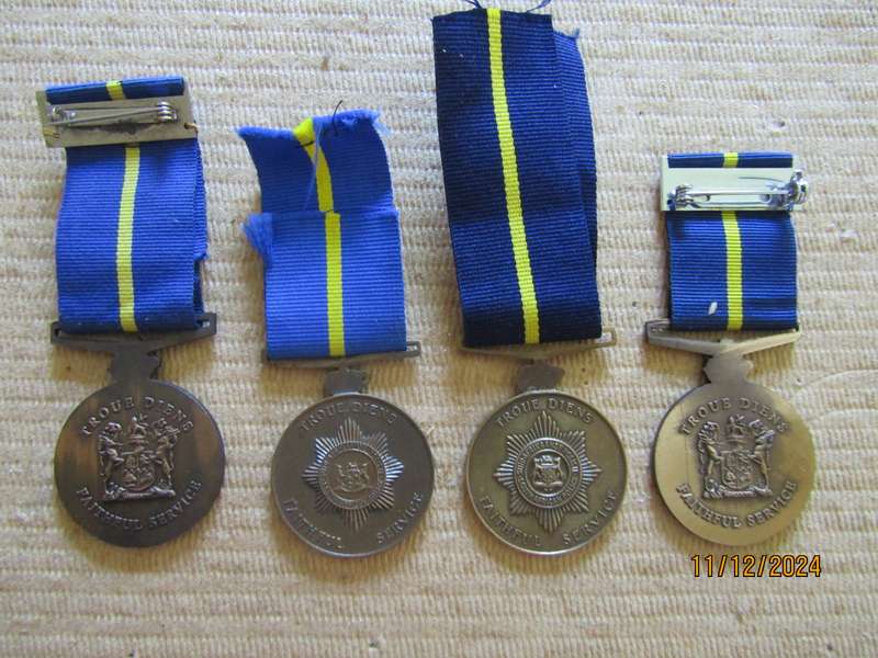 4 SAPS Faithfull Service medals Unnamed. Bid per medal