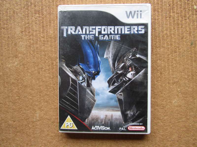 Wii Transformers The Game Nintendo Game no Booklet. Disk has scratches.