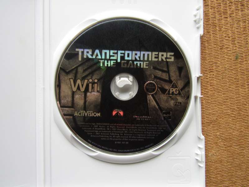 Wii Transformers The Game Nintendo Game no Booklet. Disk has scratches.