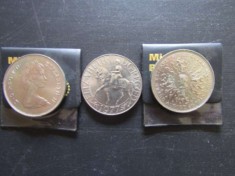 3 British Crowns size coins
