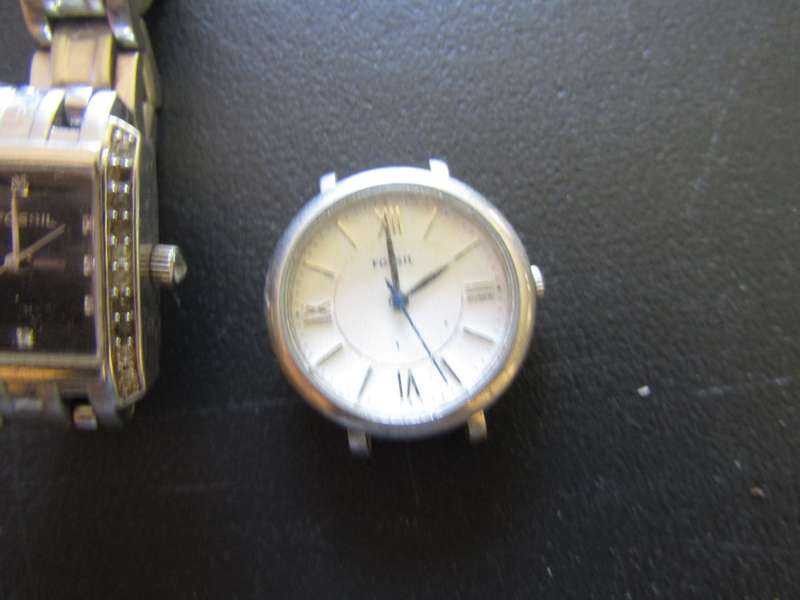 Two Female Fossil Wrist watches. Needs Battery. Is working.