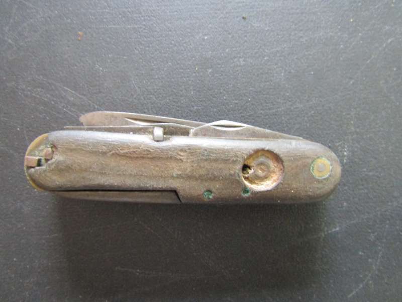 15 Cm Elbeco multi Knife with wooden Handel.