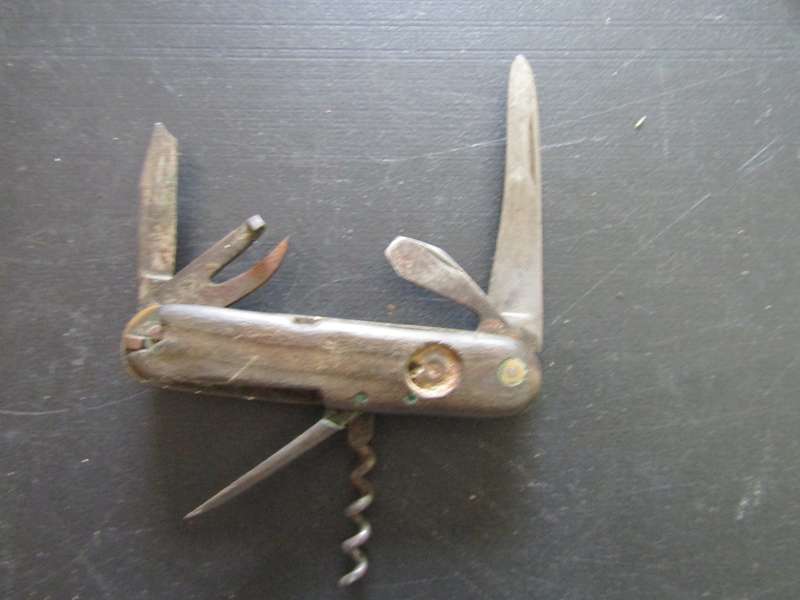 15 Cm Elbeco multi Knife with wooden Handel.