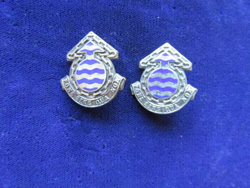 Pair of Army Logistic Ordinance Collar Badges. Pins intact.