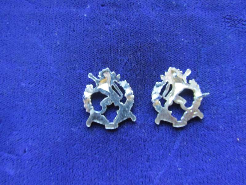 Pair of Regiment Highveld Collar Badges. Pins intact.