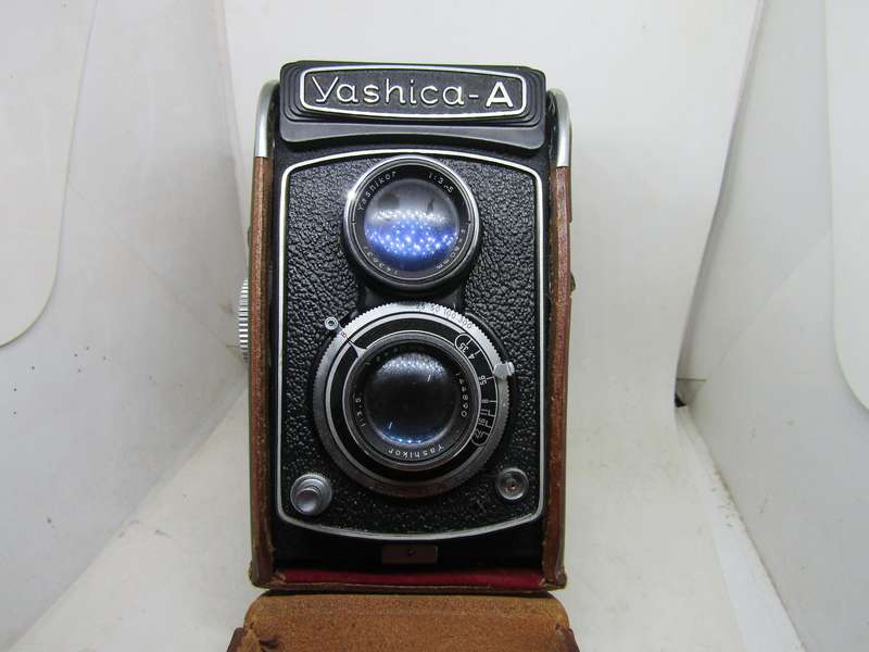 Vintage Yashica A Copal Double lens Camera in Leather casing.