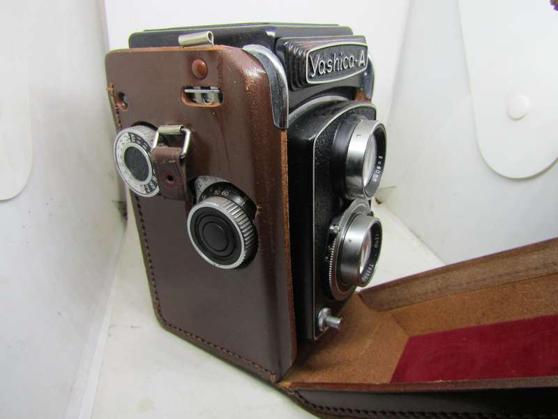 Vintage Yashica A Copal Double lens Camera in Leather casing.