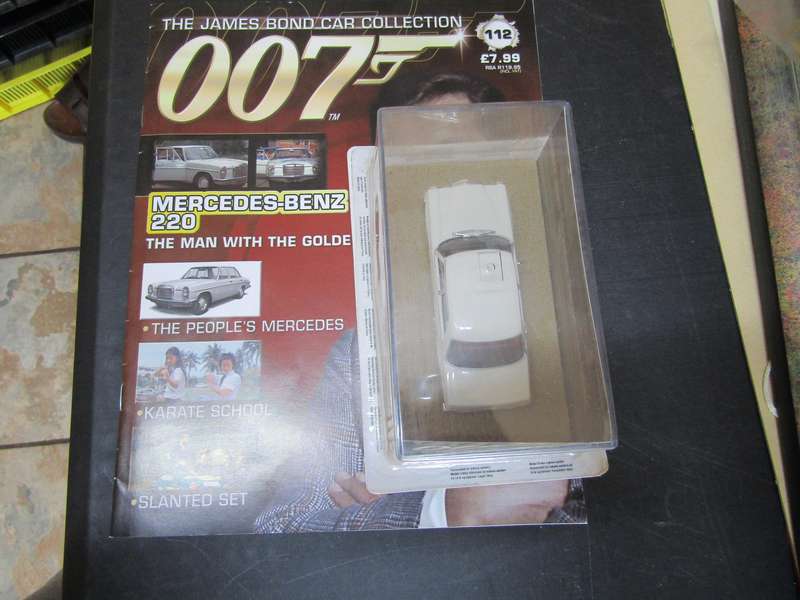 007 Mercedes Benz 220 - The Man with the Golden Gun - scale 1/43. Sealed. With Book Nr 112