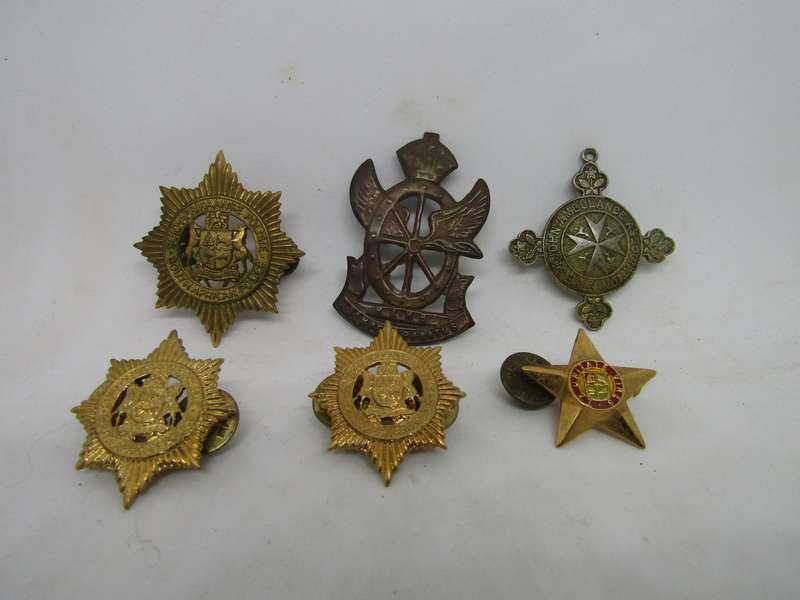 Various SADF Badges. All pins intact.