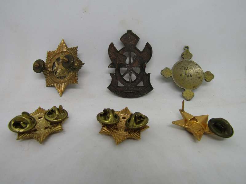 Various SADF Badges. All pins intact.