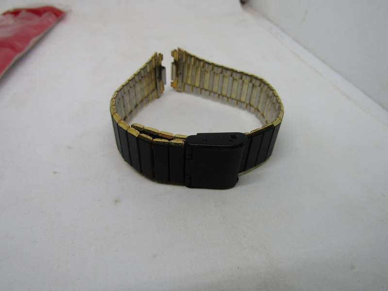 New old Stock Black and Gold Men's watch Bracelet 1.5cm across. 2cm at pin