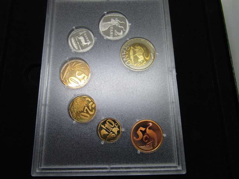 2008 South African Proof set . Mintage < 2000. One sealed. Bid per set