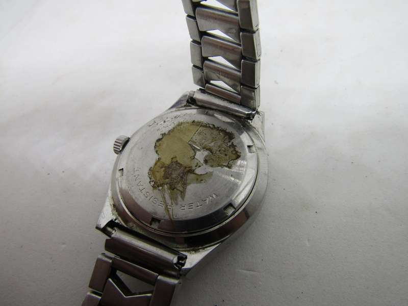 Natron  Men's Wrist watch. For Spares and restoration works but stops. Selotape mon back