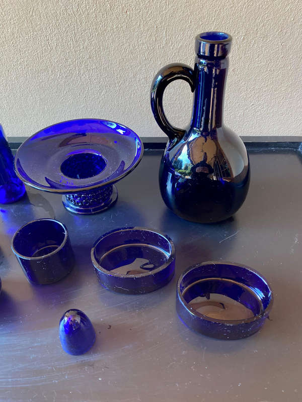 collection of blue antique glass