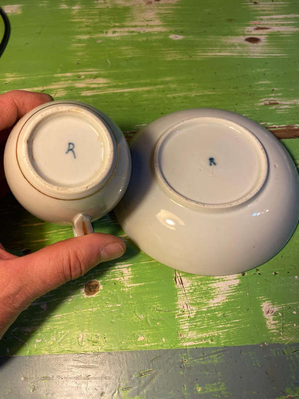Antique German porcelain cups and saucers