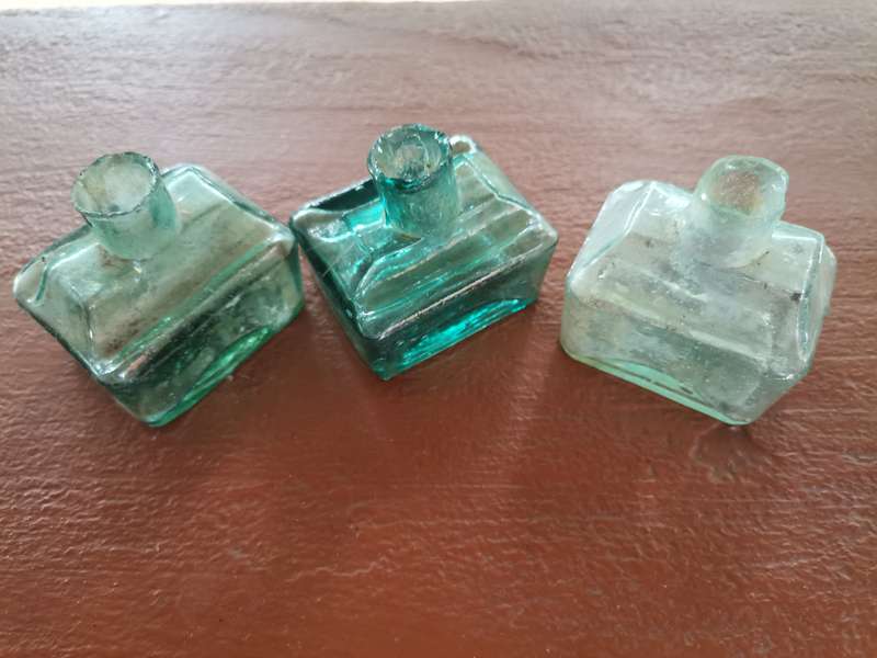 Three antique ink bottles