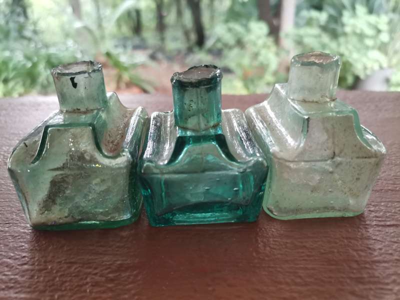 Three antique ink bottles