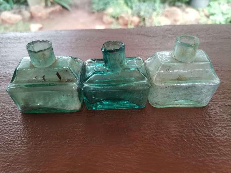 Three antique ink bottles