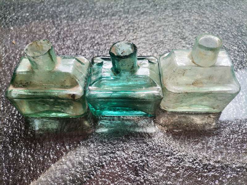Three antique ink bottles