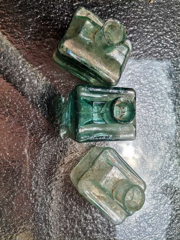 Three antique ink bottles