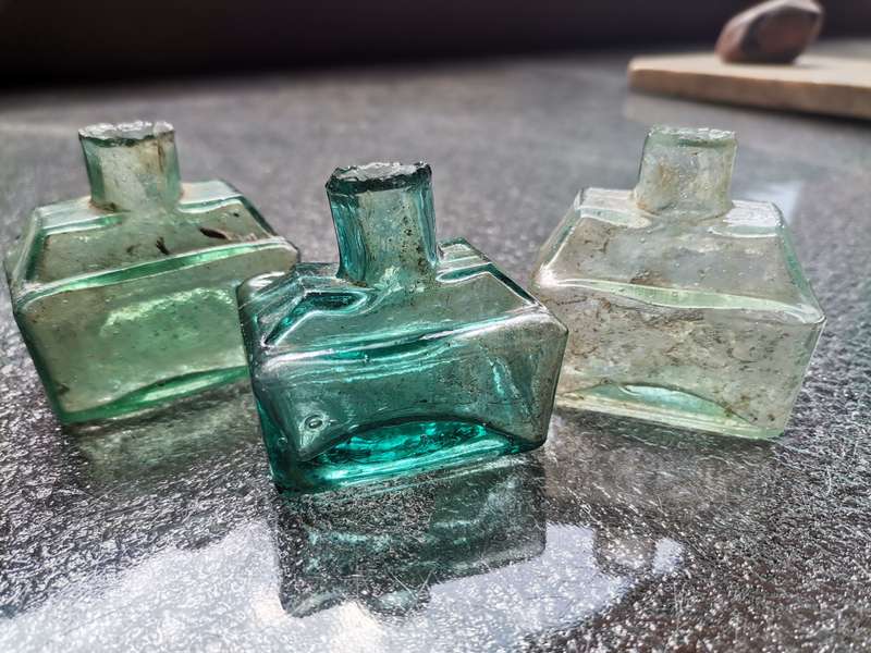 Three antique ink bottles