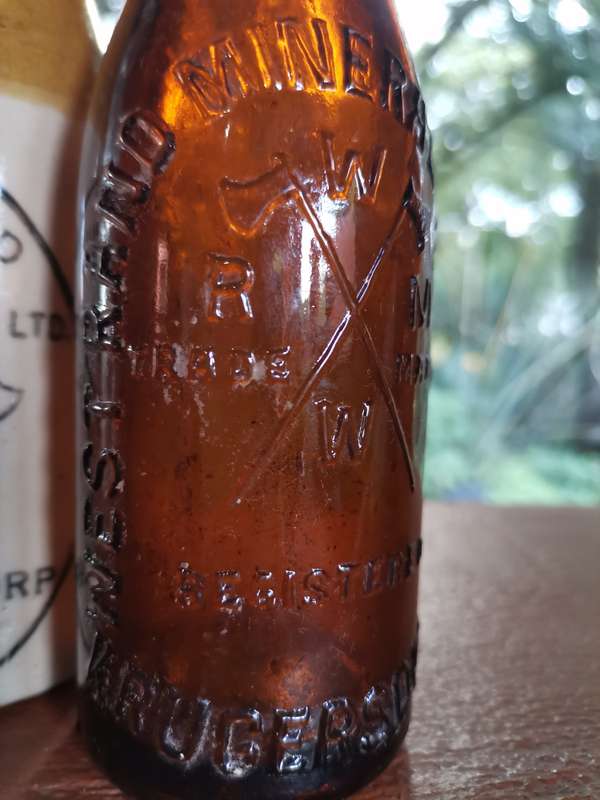 Three antique bottles