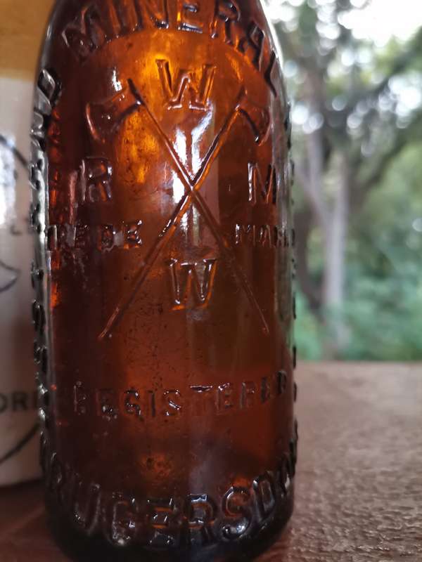 Three antique bottles