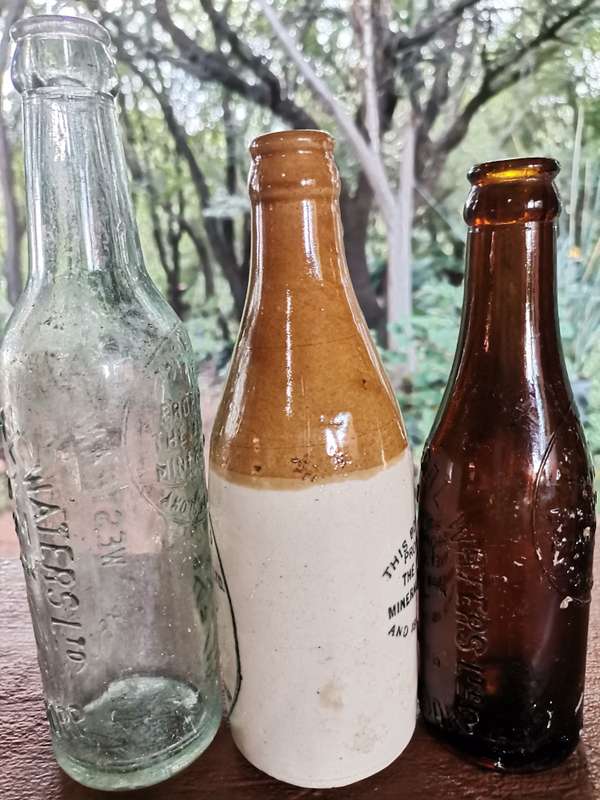 Three antique bottles