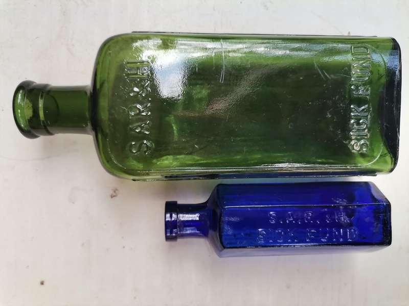 Two antique bottles SAR & H
