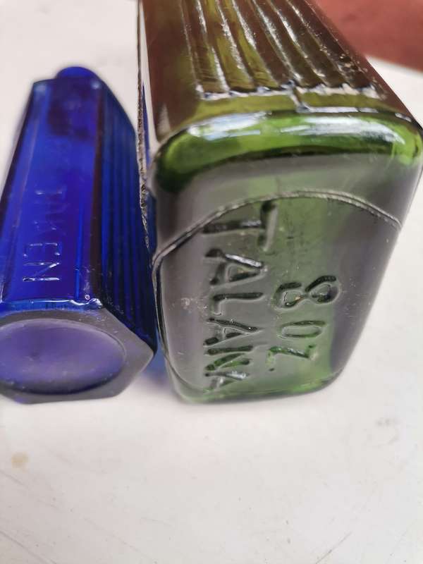 Two antique bottles SAR & H