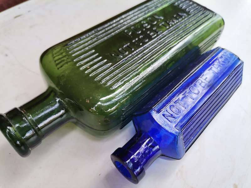 Two antique bottles SAR & H