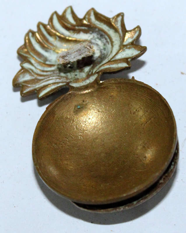 Northumberland Fusiliers cap badge (damaged)