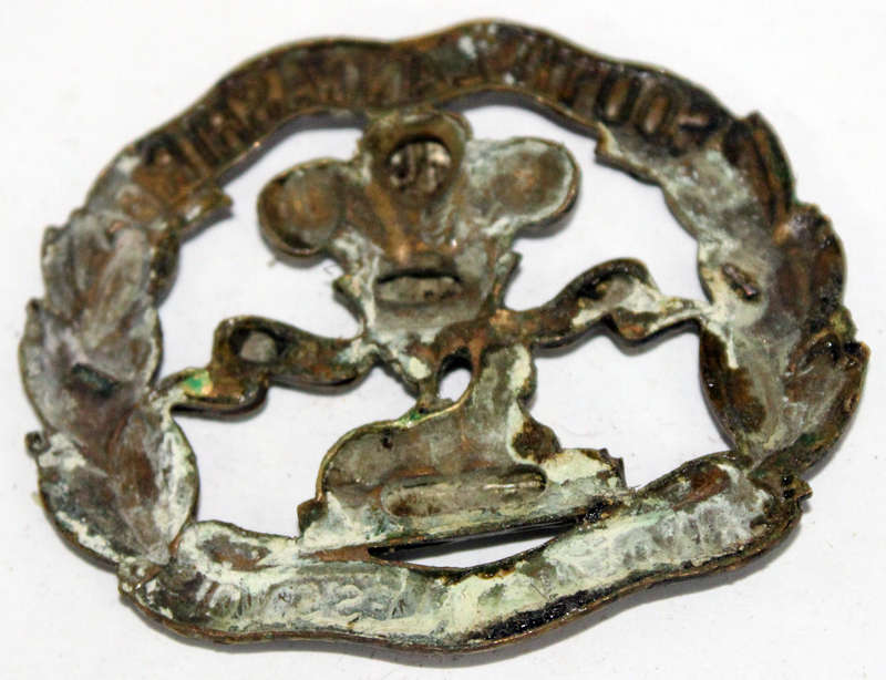 South Lancashire Regiment cap badge (damaged)